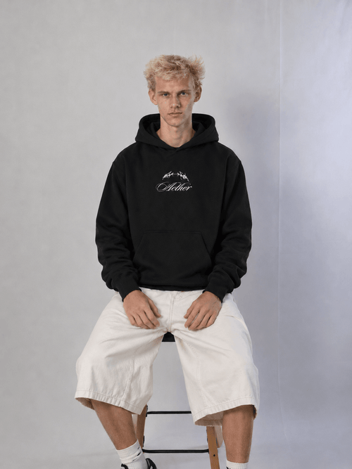 - Blacked Out Hoodie – model wearing hoodie